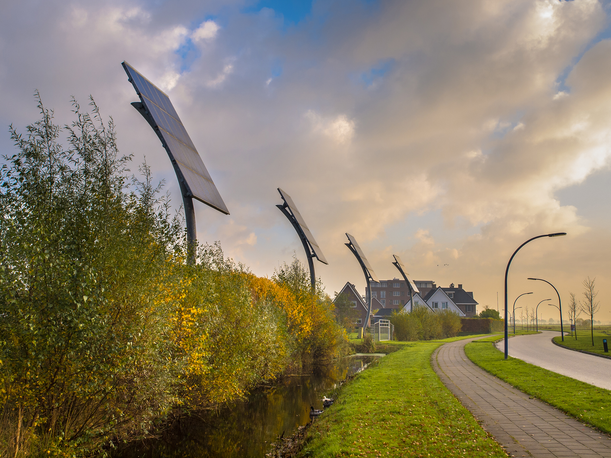 Solar panels on path outside of a community